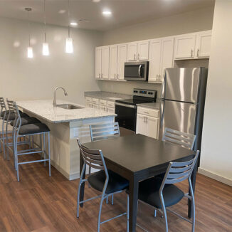 Kitchen furnished with stainless steel appliances